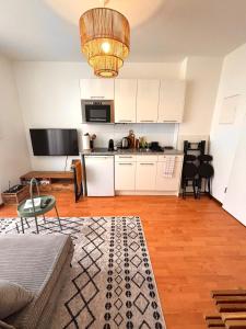 Kuchyň nebo kuchyňský kout v ubytování Helle Wohnung im Herzen von Zürich 24h CheckIn