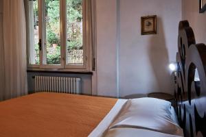 Postel nebo postele na pokoji v ubytování Bridge Hotel
