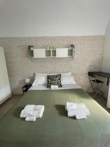 Postel nebo postele na pokoji v ubytování Cliffhouse - Guest House