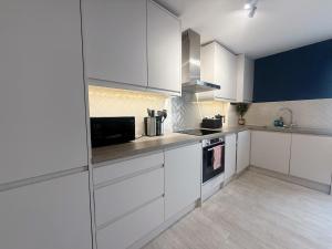 Кухня или мини-кухня в Seafront Two Bedrooms Two bathrooms slp 5
