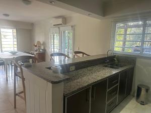 a kitchen with a sink and a counter top at La Colorada Dolores in Dolores