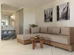 a living room with a couch and a table at The Chedi El Gouna in Hurghada