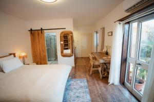 埃拉特独特套房山林小屋客房内的一张或多张床位