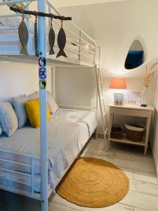 Ένα ή περισσότερα κρεβάτια σε δωμάτιο στο Maison proche plage et Golf