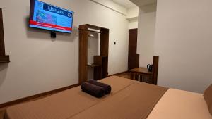 TV o dispositivi per l'intrattenimento presso Sun Dove Suite