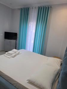 Postel nebo postele na pokoji v ubytování Hotel Erta