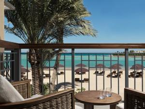 a view of the beach from the balcony of a resort at The Chedi El Gouna in Hurghada