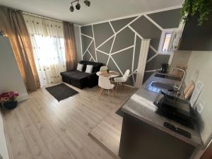 an aerial view of a kitchen and living room at Emmaia Escape Eforie Nord in Eforie Nord