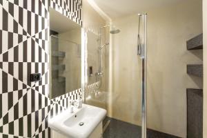 Uma casa de banho em Apartmány Holiday