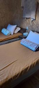 Ein Bett oder Betten in einem Zimmer der Unterkunft Atami Ikyuan 熱海一休庵
