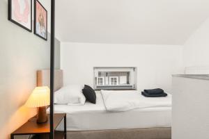 Ένα ή περισσότερα κρεβάτια σε δωμάτιο στο LUX - Design Loft - Zentral - Nintendo +17 φωτογραφίες