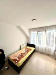 Ένα ή περισσότερα κρεβάτια σε δωμάτιο στο Casa la Cristi