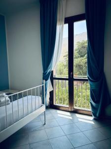 Postel nebo postele na pokoji v ubytování Hotel Achibea