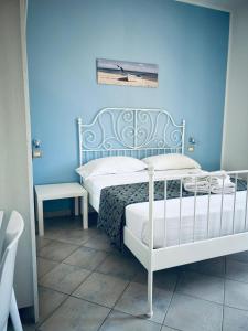 Postel nebo postele na pokoji v ubytování Hotel Achibea