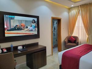 تلفاز و/أو أجهزة ترفيهية في Executive Hotel and Suites