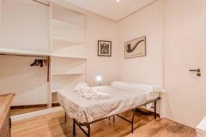 Ένα ή περισσότερα κρεβάτια σε δωμάτιο στο Green Loft di Trastevere