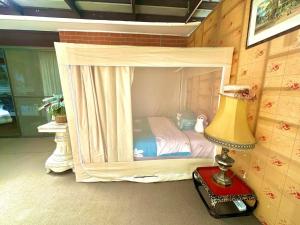 Postel nebo postele na pokoji v ubytování Jalynn homestay