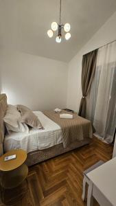 Postel nebo postele na pokoji v ubytování Villa Lucija
