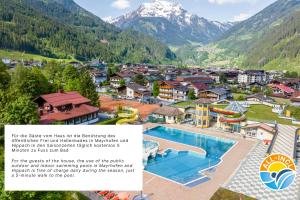 Un artículo de revista sobre un complejo turístico en las montañas. en Vronis Waldhaus ADULTS ONLY, en Mayrhofen