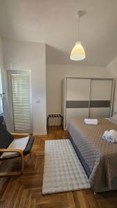Postel nebo postele na pokoji v ubytování Villa Lucija