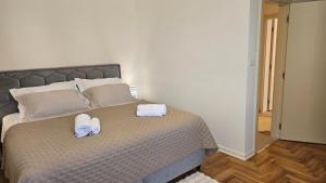 Postel nebo postele na pokoji v ubytování Villa Lucija