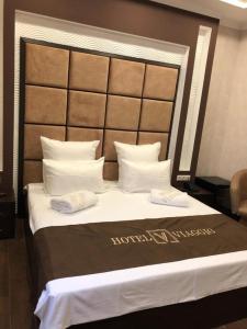 Letto o letti in una camera di VIAGGIO Hotel BY VG