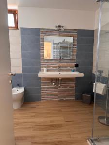 a bathroom with a sink and a mirror at Da Francesca in Foria