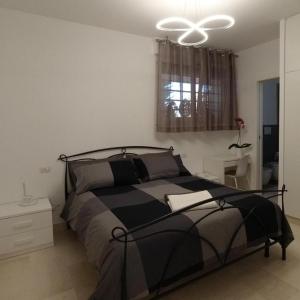 Postel nebo postele na pokoji v ubytování B&B Milena