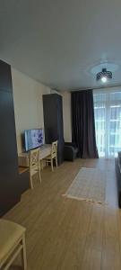 Телевизор и/или развлекательный центр в Solo Visit Apartments 1307 C