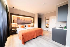Postel nebo postele na pokoji v ubytování JustStay Mülheim Hotel & Apartments