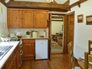 Kuchyň nebo kuchyňský kout v ubytování Ivy Cottage + 5 fotografií