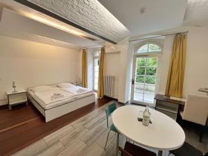 Postel nebo postele na pokoji v ubytování GLS Studio Hotel Berlin
