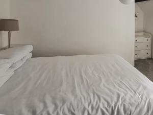 Postel nebo postele na pokoji v ubytování Haycraft Cottage
