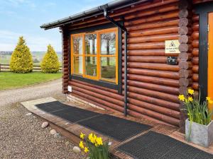 Aed väljaspool majutusasutust Ashknowe Log Cabin - S4590