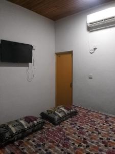 Postel nebo postele na pokoji v ubytování No Name Addalachenai