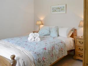 Katil atau katil-katil dalam bilik di The Garden Cottage