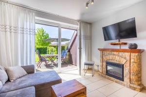 Μια τηλεόραση ή/και κέντρο ψυχαγωγίας στο Haus Breeger Anker - Strandnahes Haus in Breege