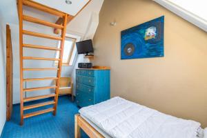 Ένα ή περισσότερα κρεβάτια σε δωμάτιο στο Haus Breeger Anker - Strandnahes Haus in Breege