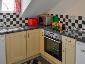 Køkken eller tekøkken på Holbeck Apartment