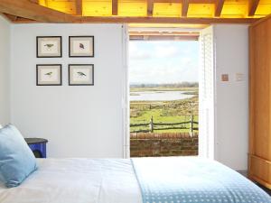 Katil atau katil-katil dalam bilik di The Barn At Banks Cottage
