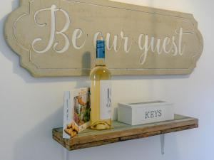 a bottle of wine sitting on a shelf at The Light House in Flamborough