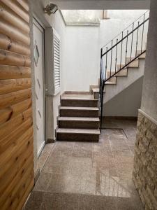 a staircase in a house with a stair case at Ferienwohnung In Vodice Mit Terrasse in Vodice