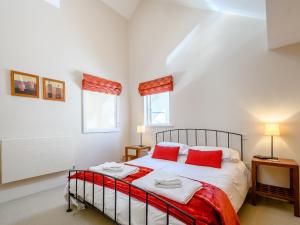 Voodi või voodid majutusasutuse Honey Cottage toas