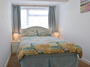 Voodi või voodid majutusasutuse Rest-A-While toas