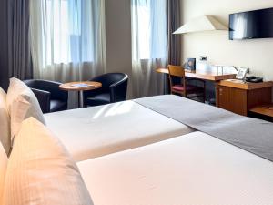 Postel nebo postele na pokoji v ubytování Abba Sants