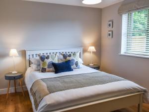 Postel nebo postele na pokoji v ubytování Hobby Lodge