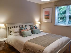 Postel nebo postele na pokoji v ubytování Hobby Lodge