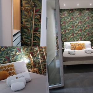 a room with a bed and a wall mural at Bed Nonnonino in Porto Cesareo