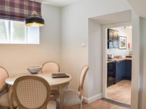 Kuchyň nebo kuchyňský kout v ubytování Crogen Gatehouse Lodge