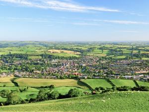 an aerial view of a town in a green field at Kites Nest-Qu7488 in Highgate